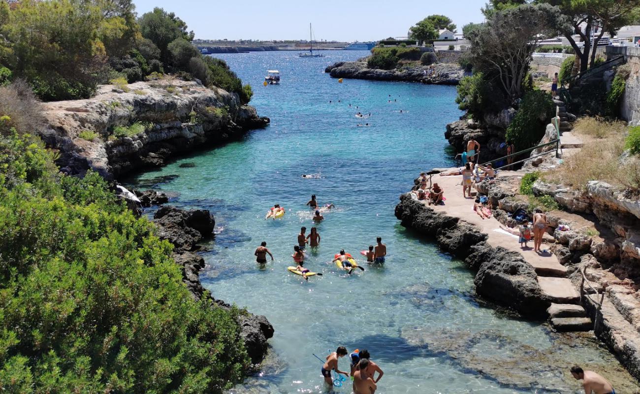 Photo of Platja de Sa Farola with bright sand surface