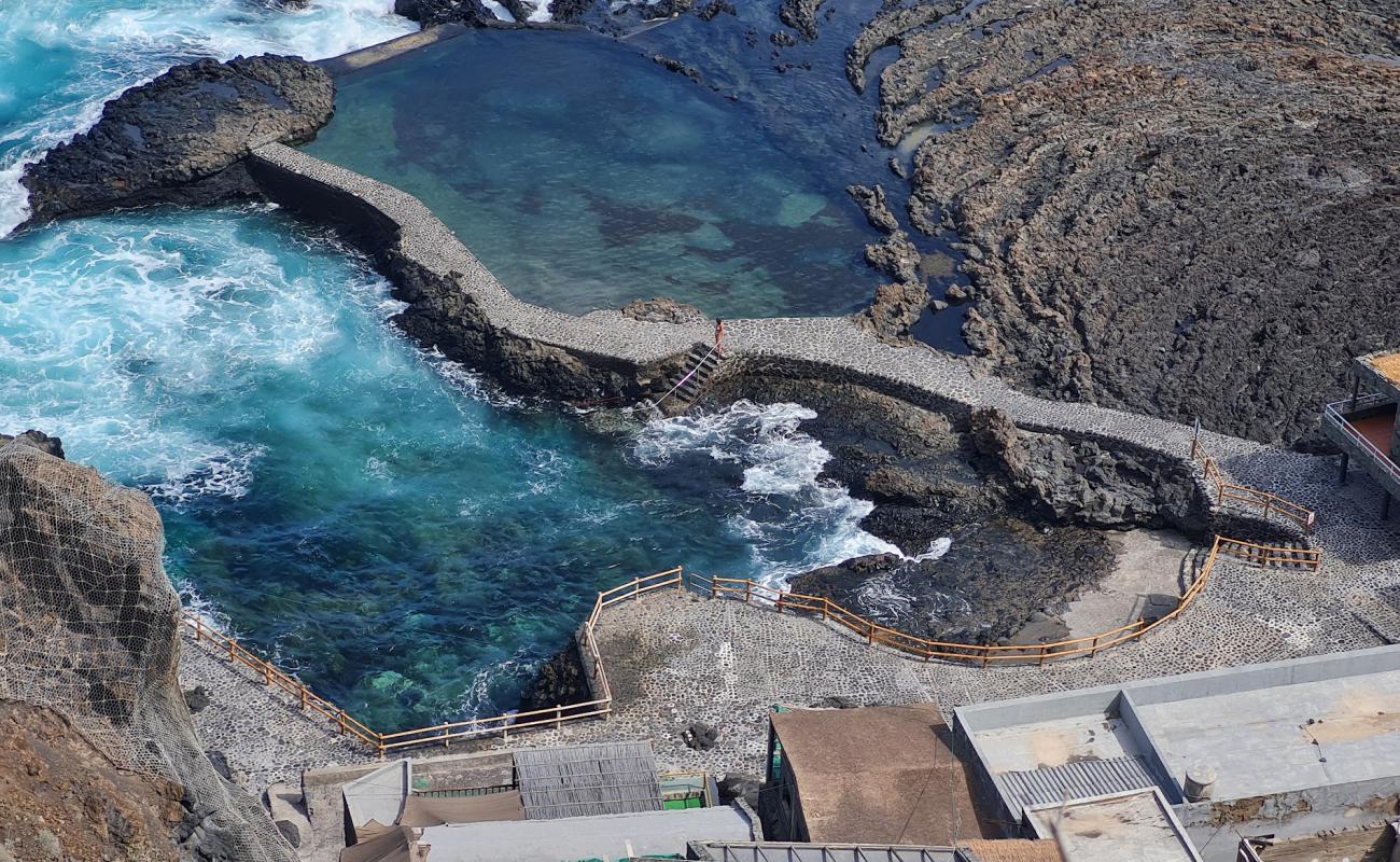 Photo of Pozo de Las Calcosas with rocks cover surface