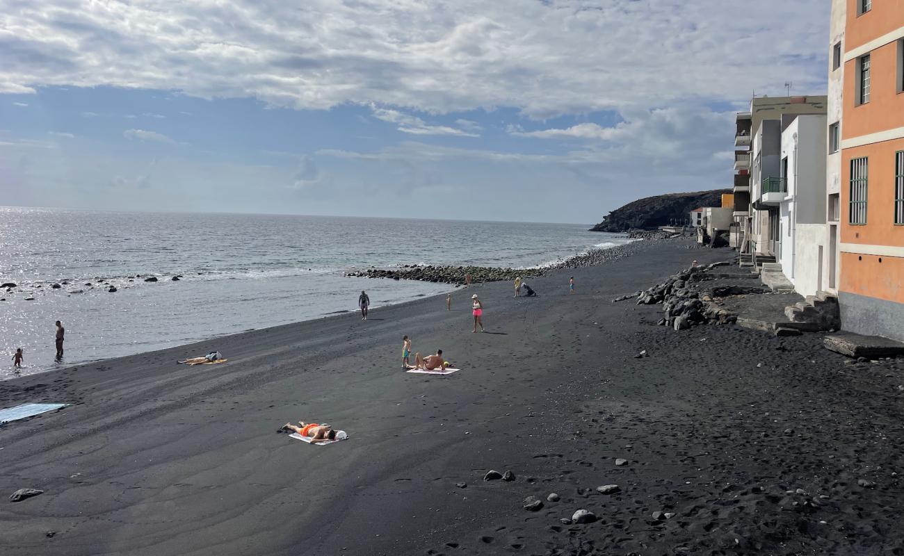 Photo of Playa Candelaria with gray sand &  rocks surface