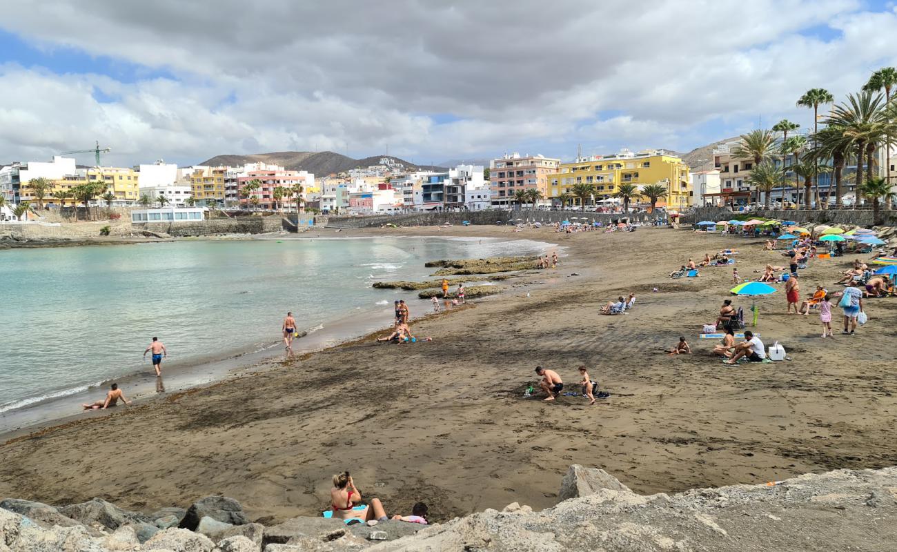 Photo of Playa de Arguineguin with gray sand surface