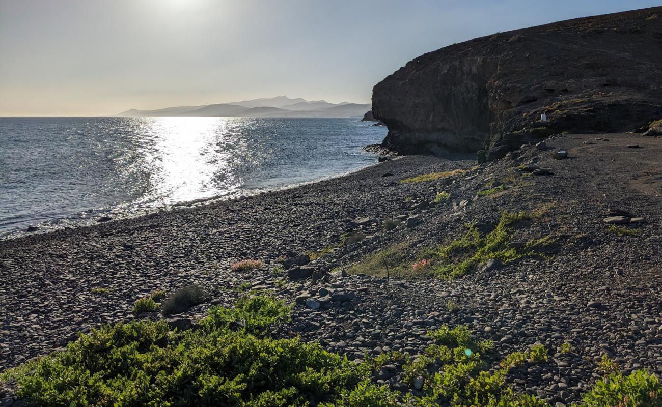 Photo of Playa de Puerto Rico with gray pebble surface