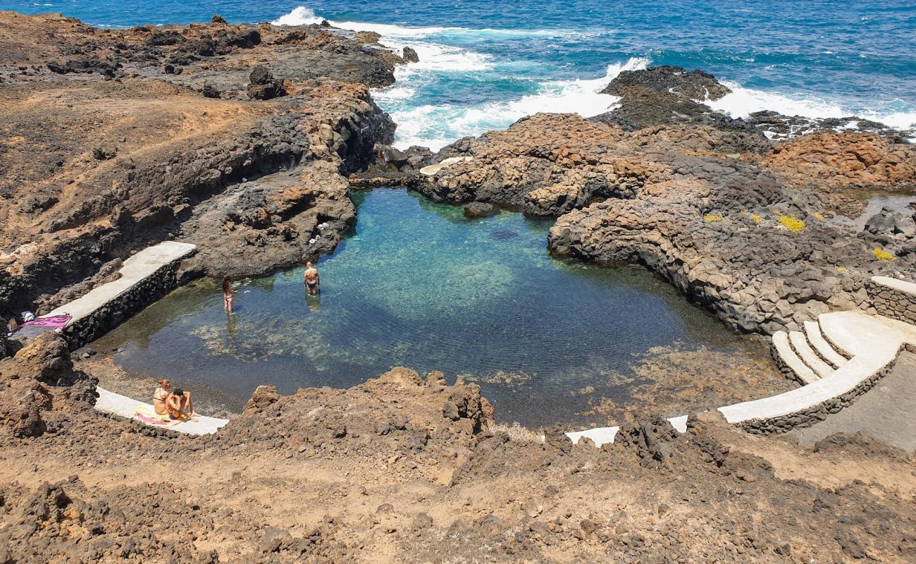 Photo of Playa Vaya Querida with gray sand &  pebble surface