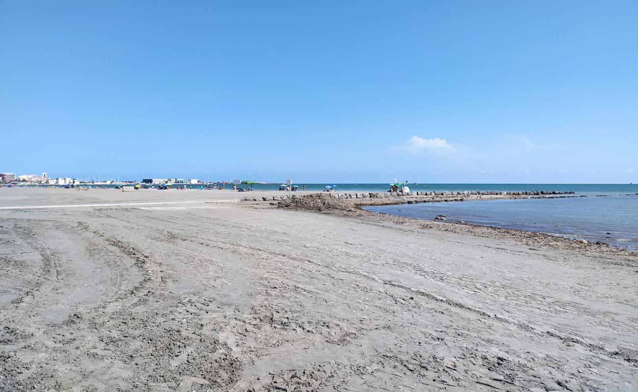 Photo of Playa Tamarit with gray sand surface