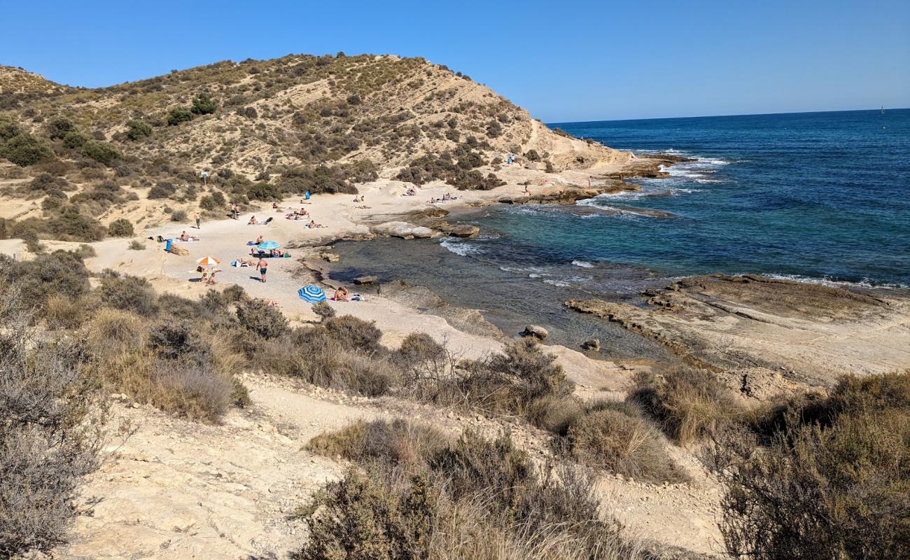 Photo of Cala Cantalar with gray sand surface