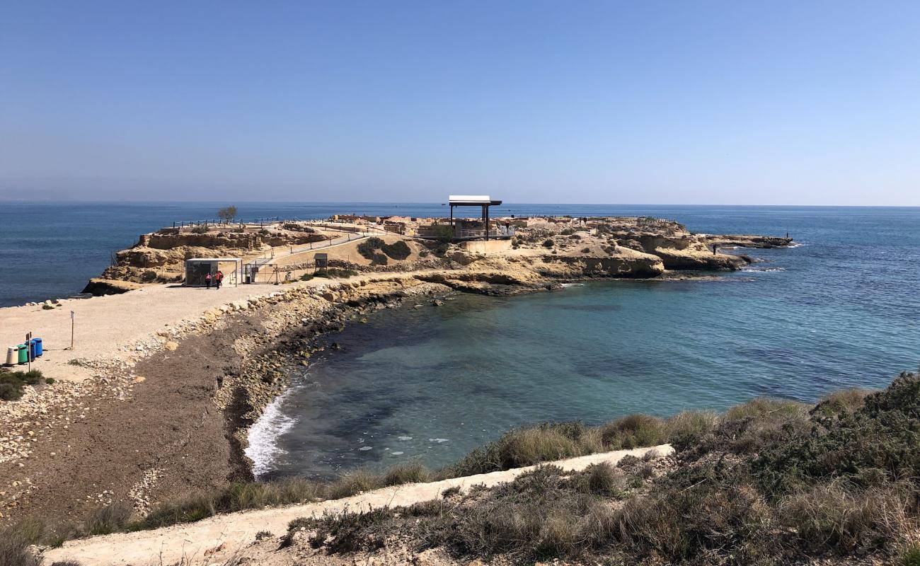 Photo of Platja dels Banyets de la Reina with rocks cover surface