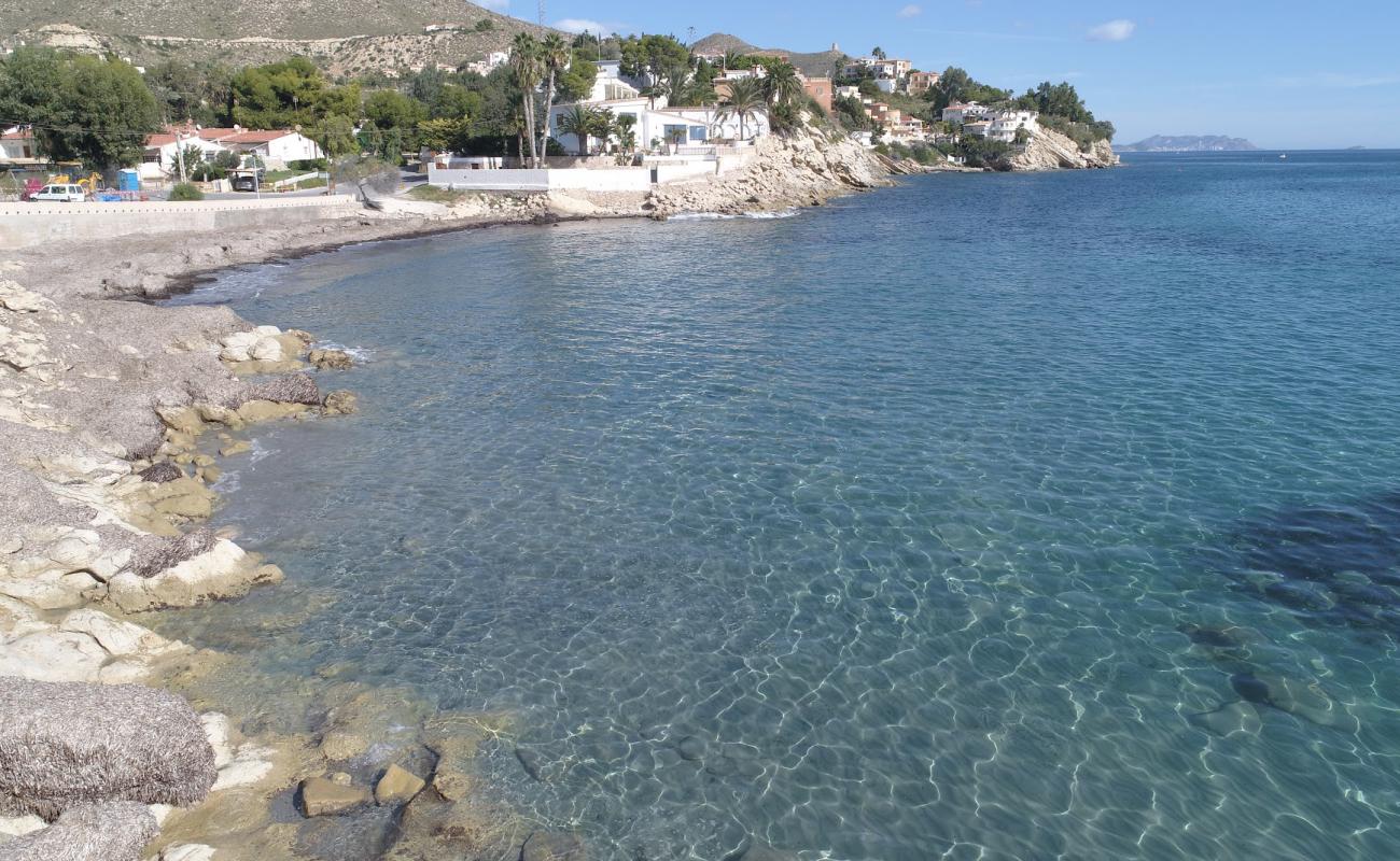 Photo of Cala Piteres with rocks cover surface