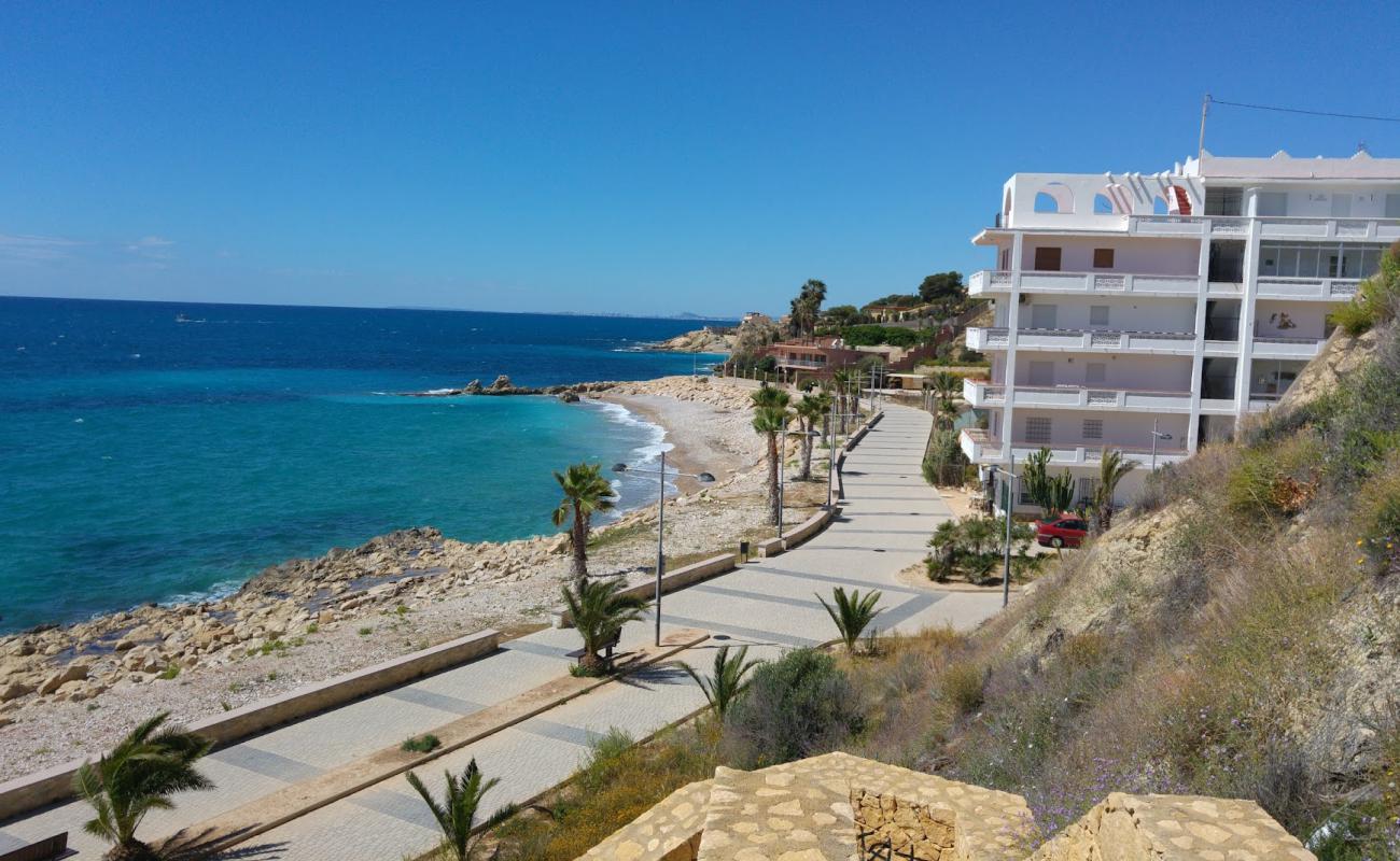 Photo of Platja El Tio Roig with gray sand &  pebble surface