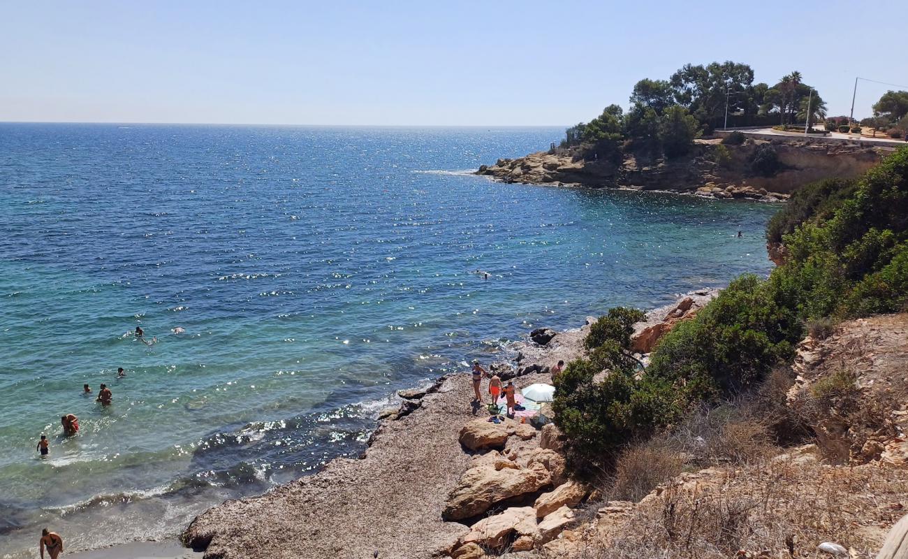 Photo of Cala La Calalga with gray sand surface