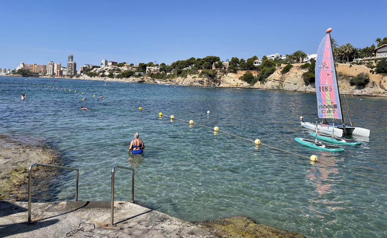 Photo of Cala Les Bassetes with rocks cover surface