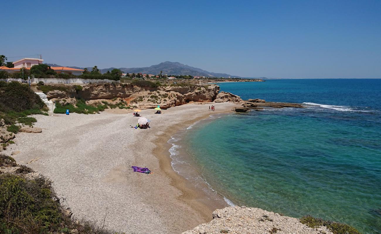 Photo of Cala de La Foradada with light pebble surface