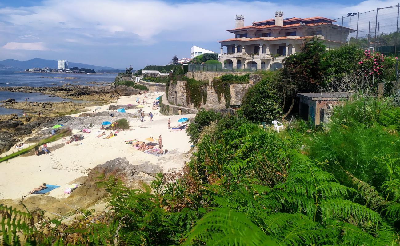 Photo of Praia da Buraca with bright sand surface