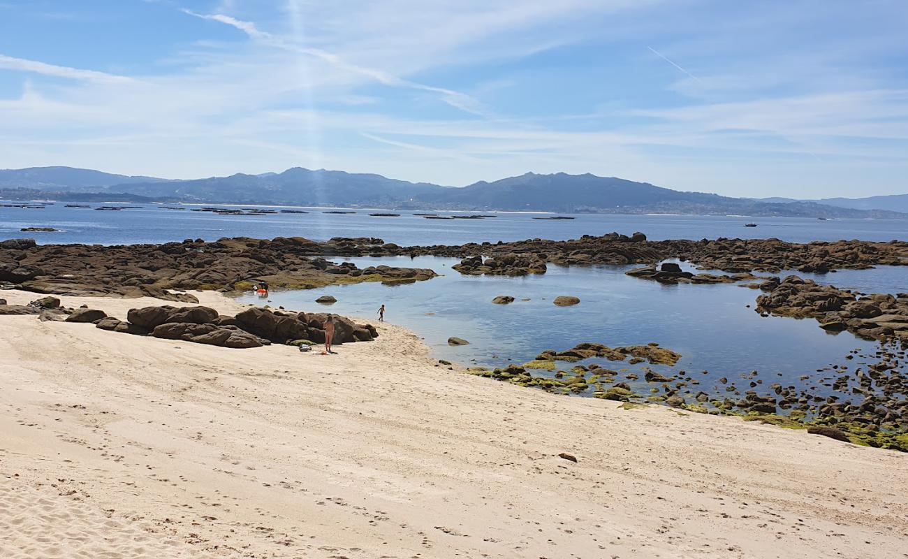 Photo of Praia dos Castros with bright sand surface