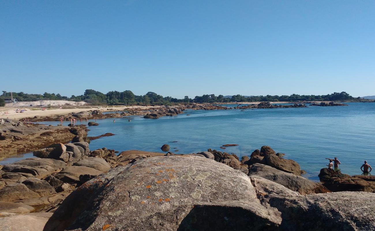 Photo of Praia do Mallon with bright sand surface