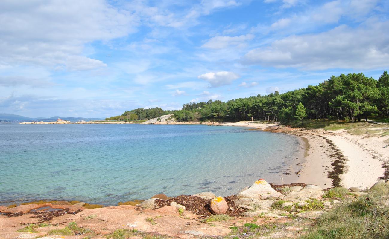 Photo of Praia Area da Secada with bright sand surface