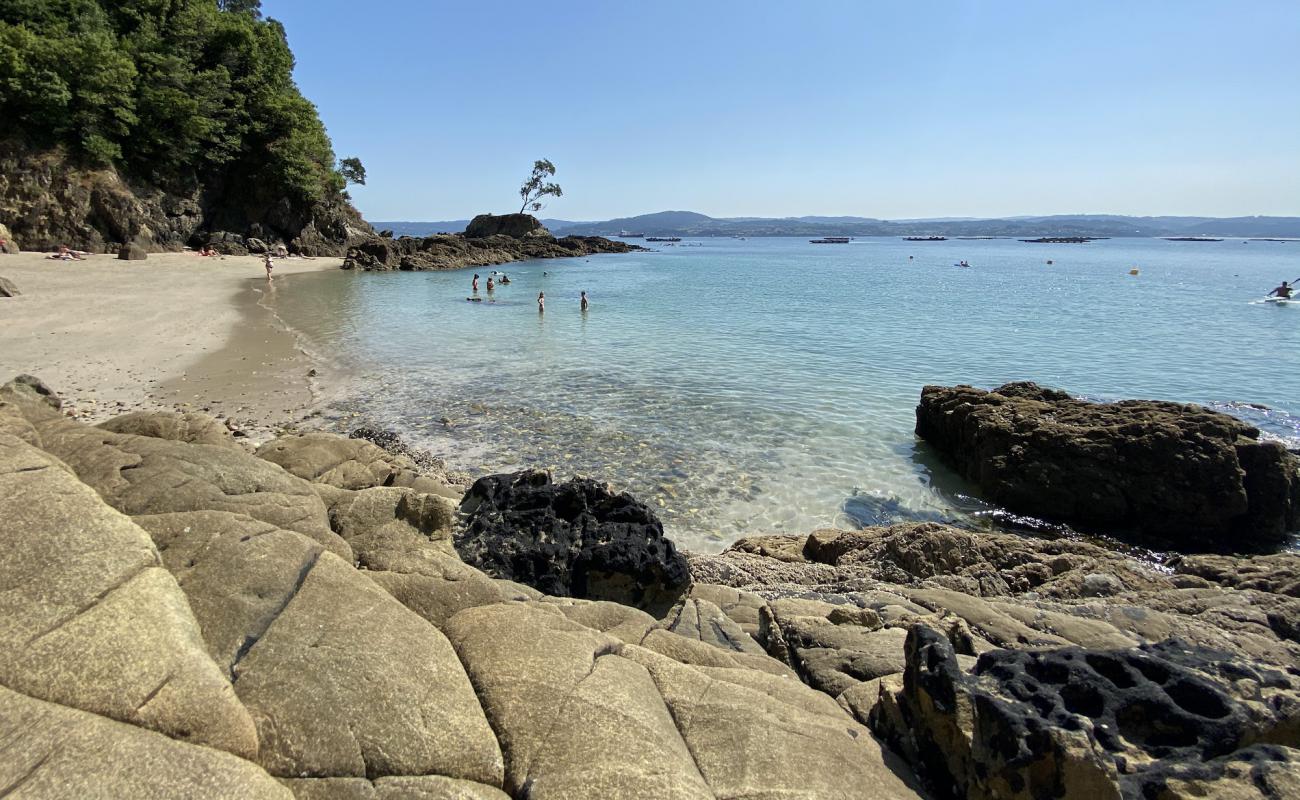 Photo of Playa de Lourido with bright sand surface