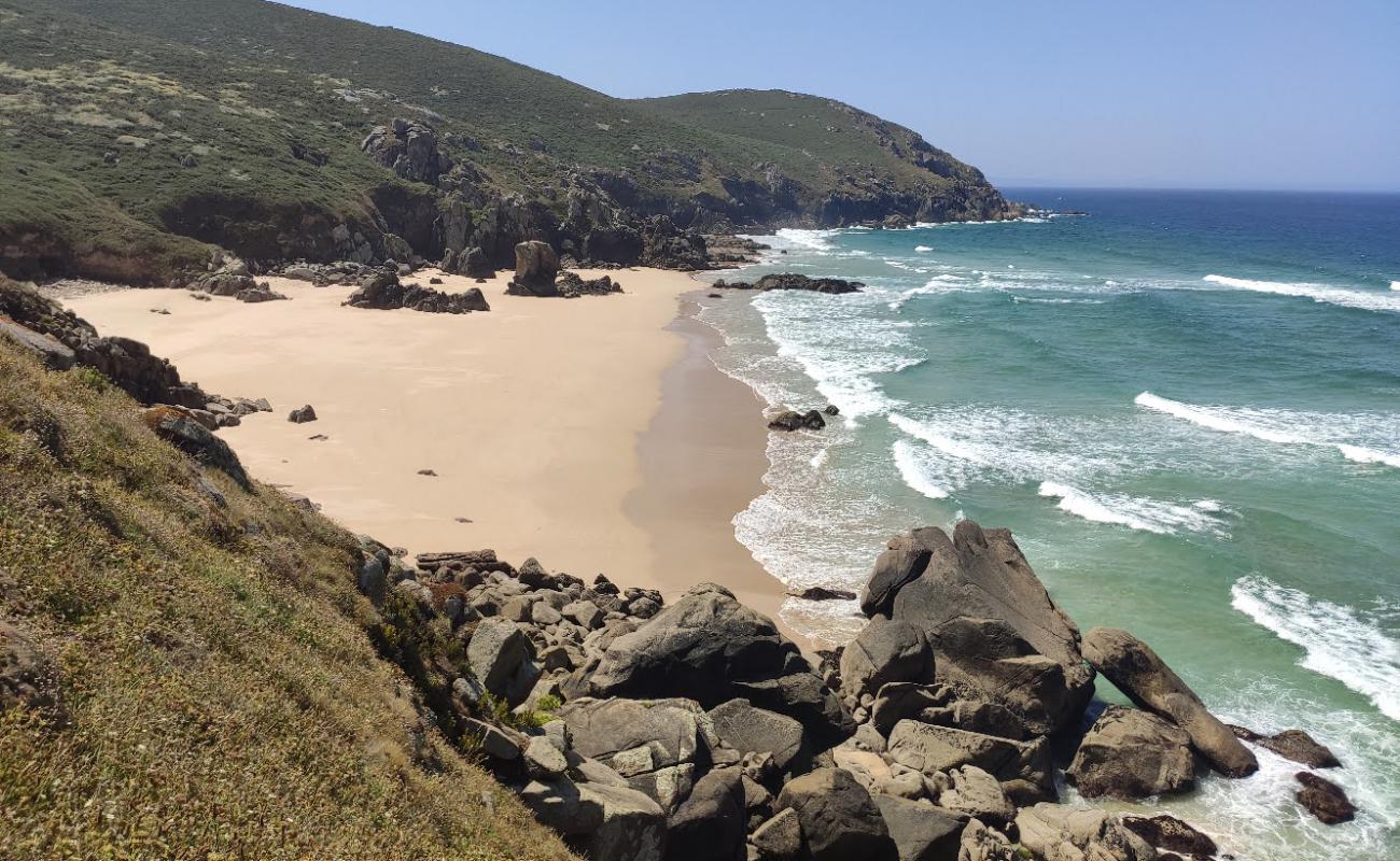 Photo of Praia de Lumebo with bright sand surface