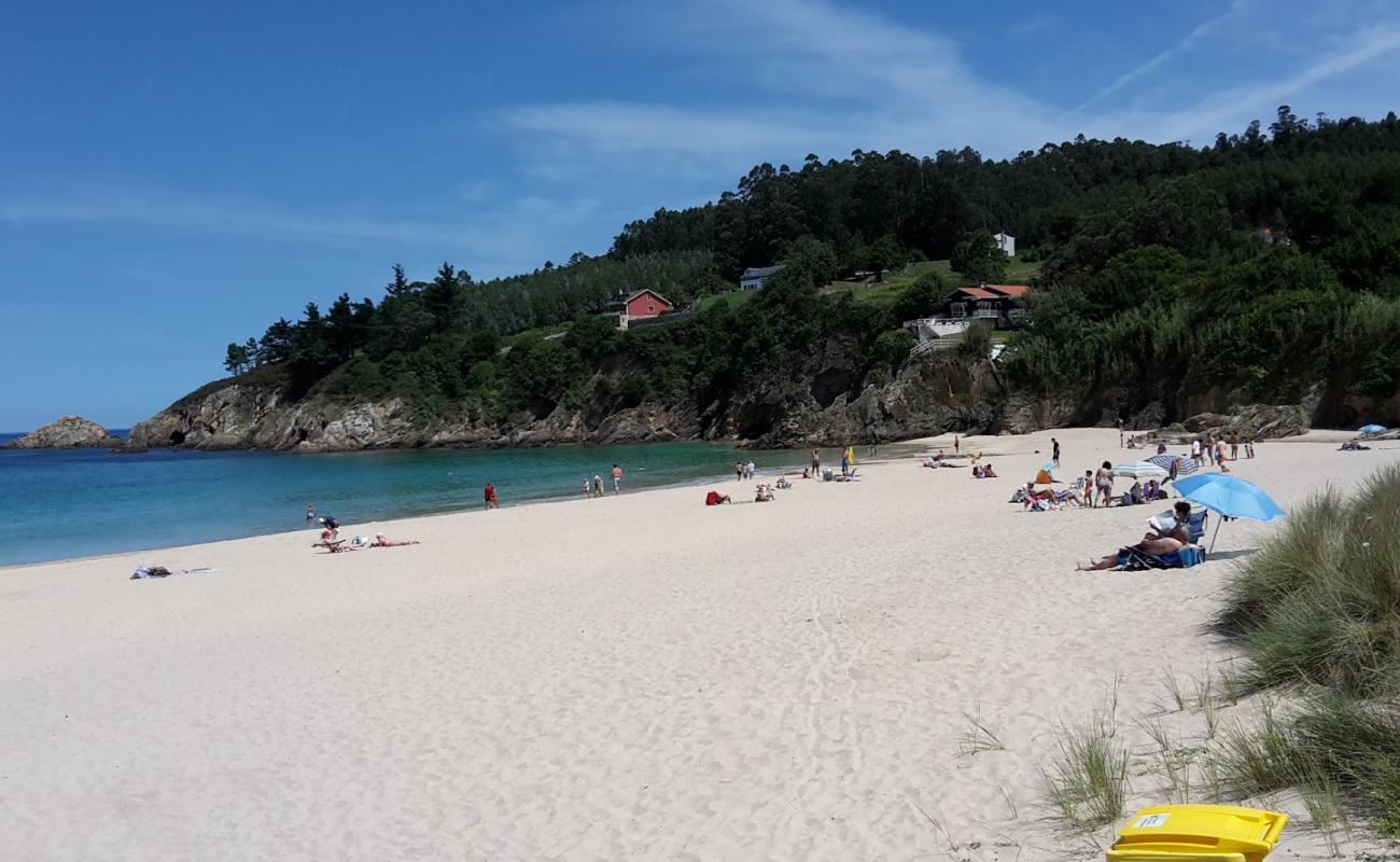 Photo of Praia de Area Longa with bright sand surface