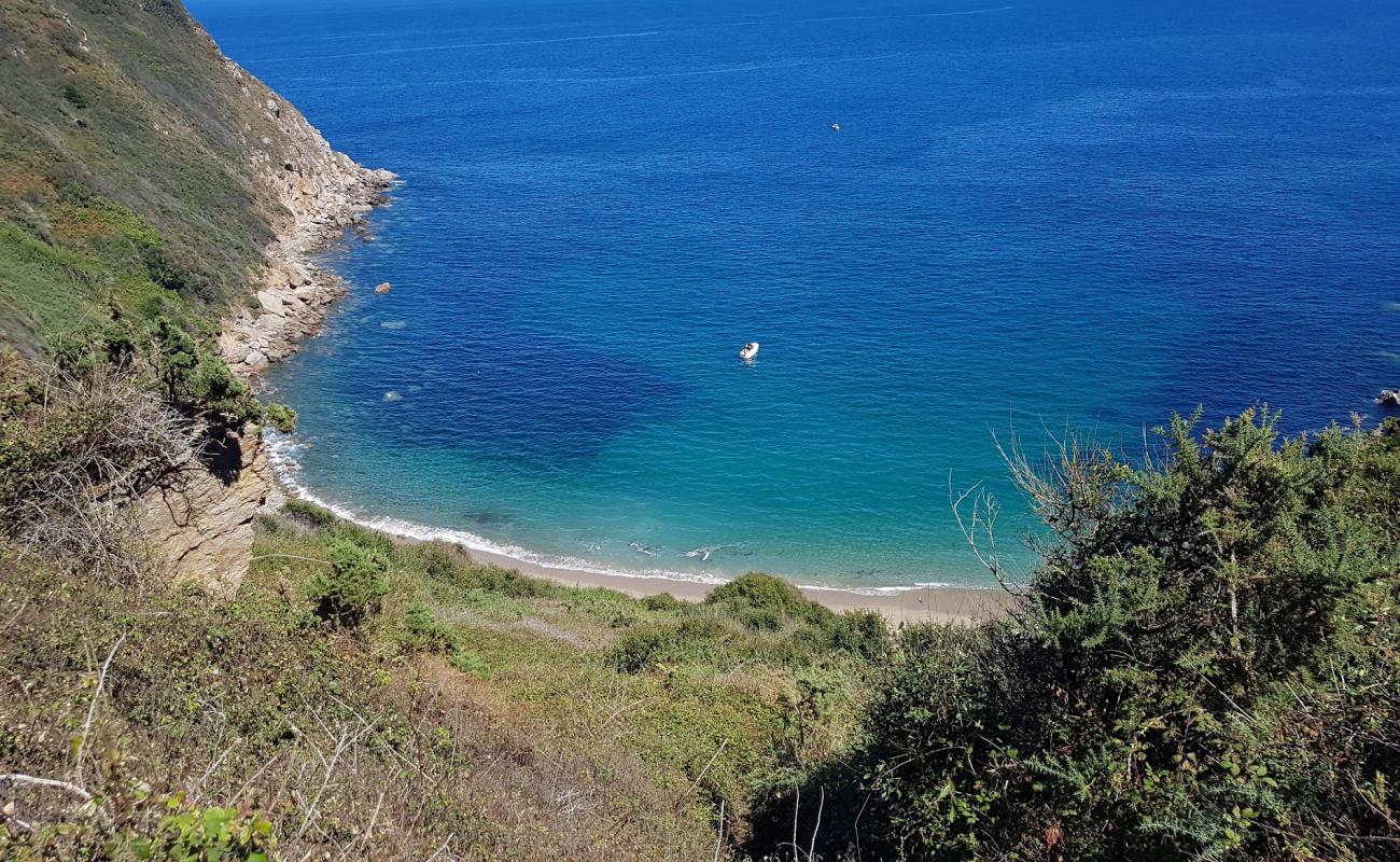 Photo of Praia Toxido with bright sand surface