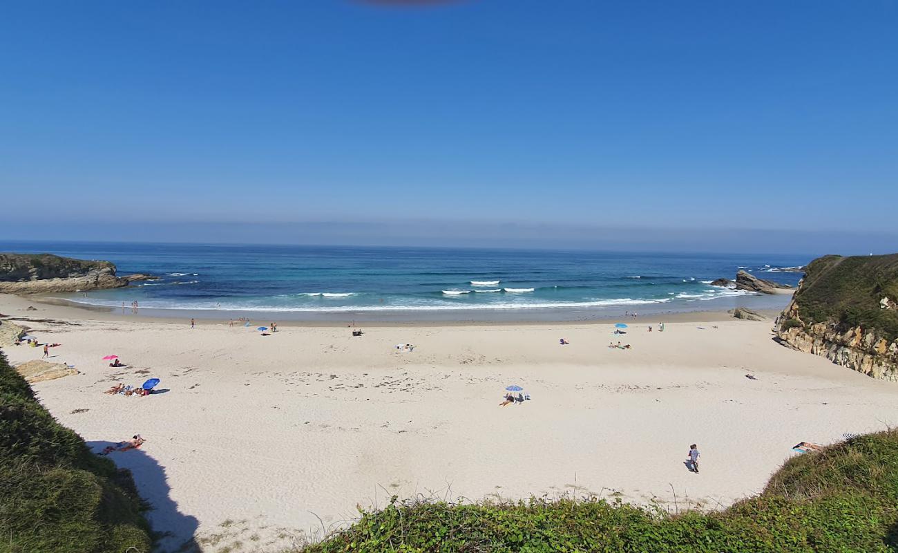 Photo of Praia Da Pasada with bright sand surface