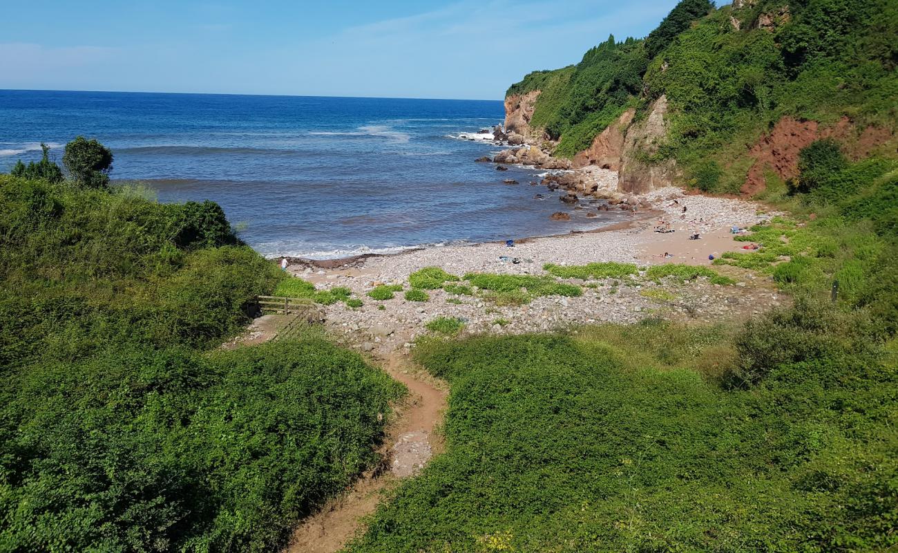 Photo of Playa de Rebolleres with gray sand &  pebble surface