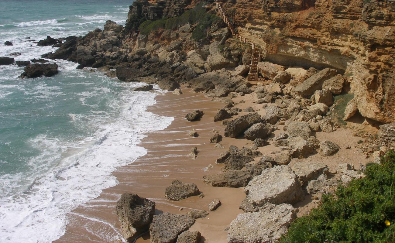 Photo of Cala de Los Pitones Beach with bright sand surface