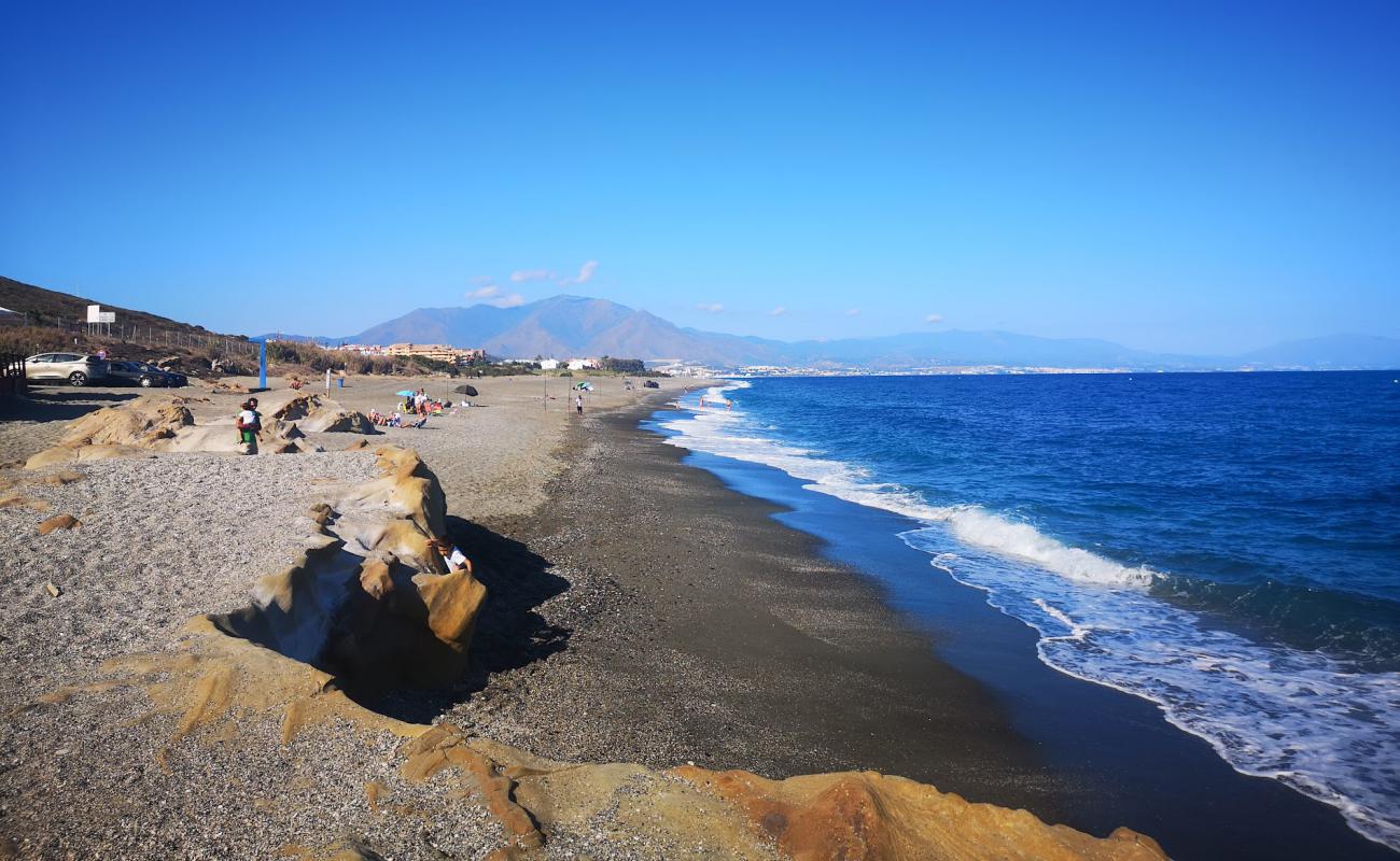 Photo of Playa Aldea with gray sand surface