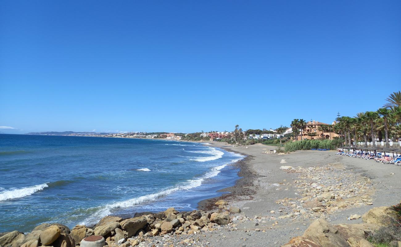 Photo of Playa de Guadalobon with gray sand &  pebble surface