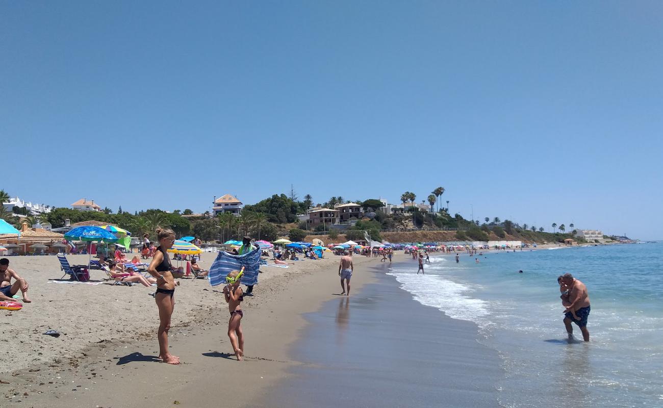 Photo of Playa de las Buganvillas with bright sand surface