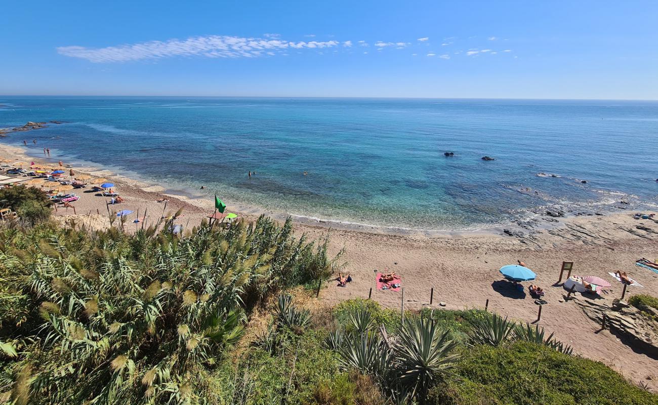 Photo of Playa Naturista de Playamarina with gray sand &  pebble surface