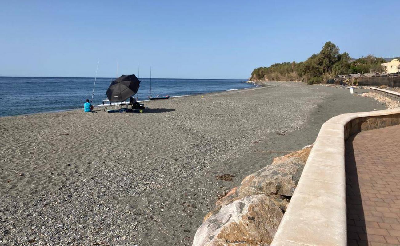 Photo of Playa Castillo de Banos with gray fine pebble surface