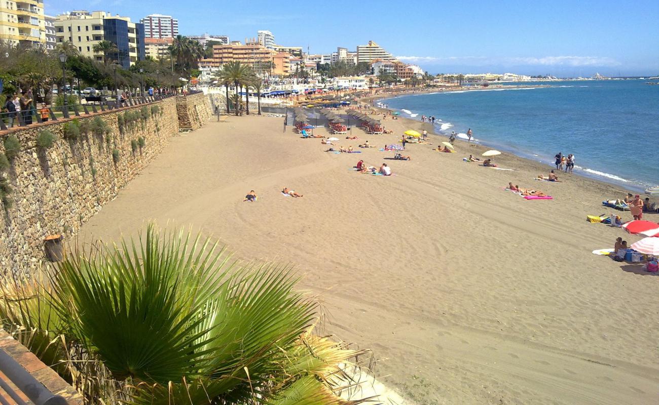 Photo of Benalmadena beach with bright sand surface