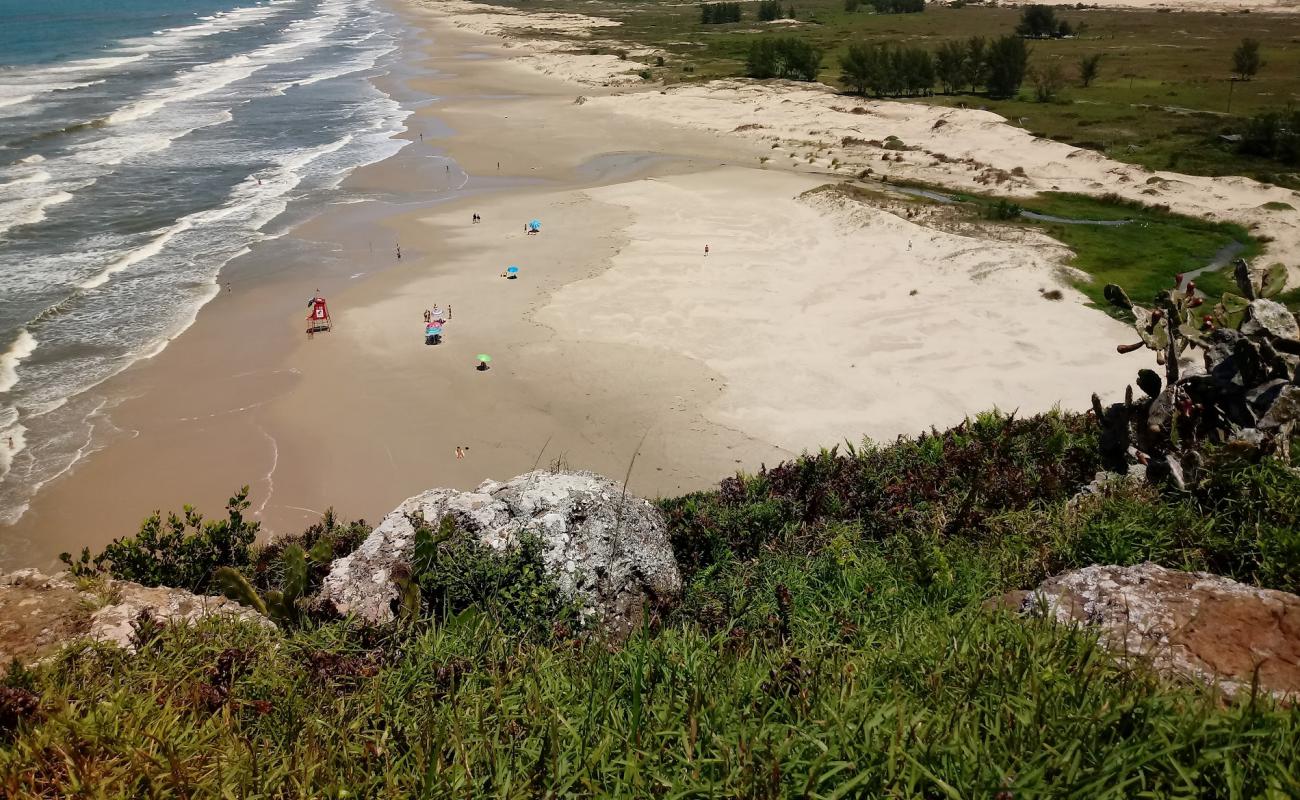 Photo of Arroio Seco Beach with bright fine sand surface