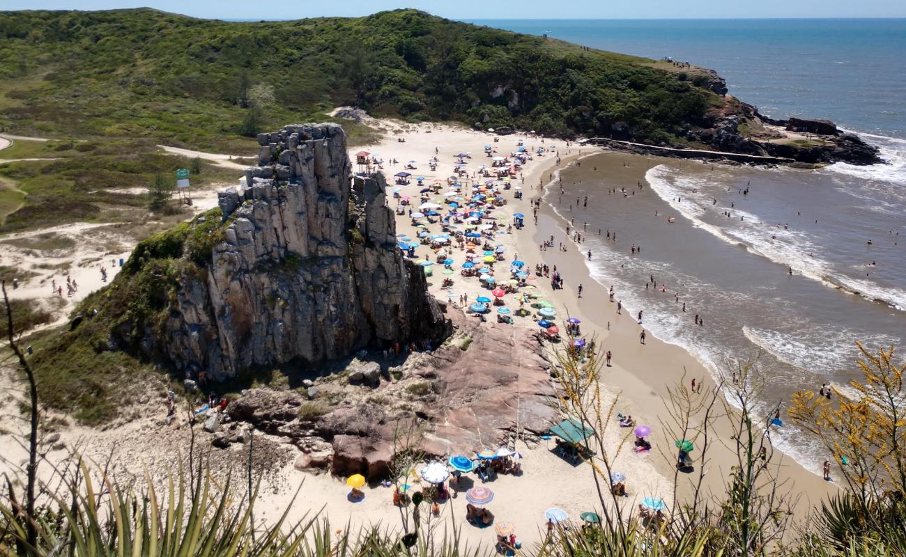 Photo of Guarita Beach with bright fine sand surface