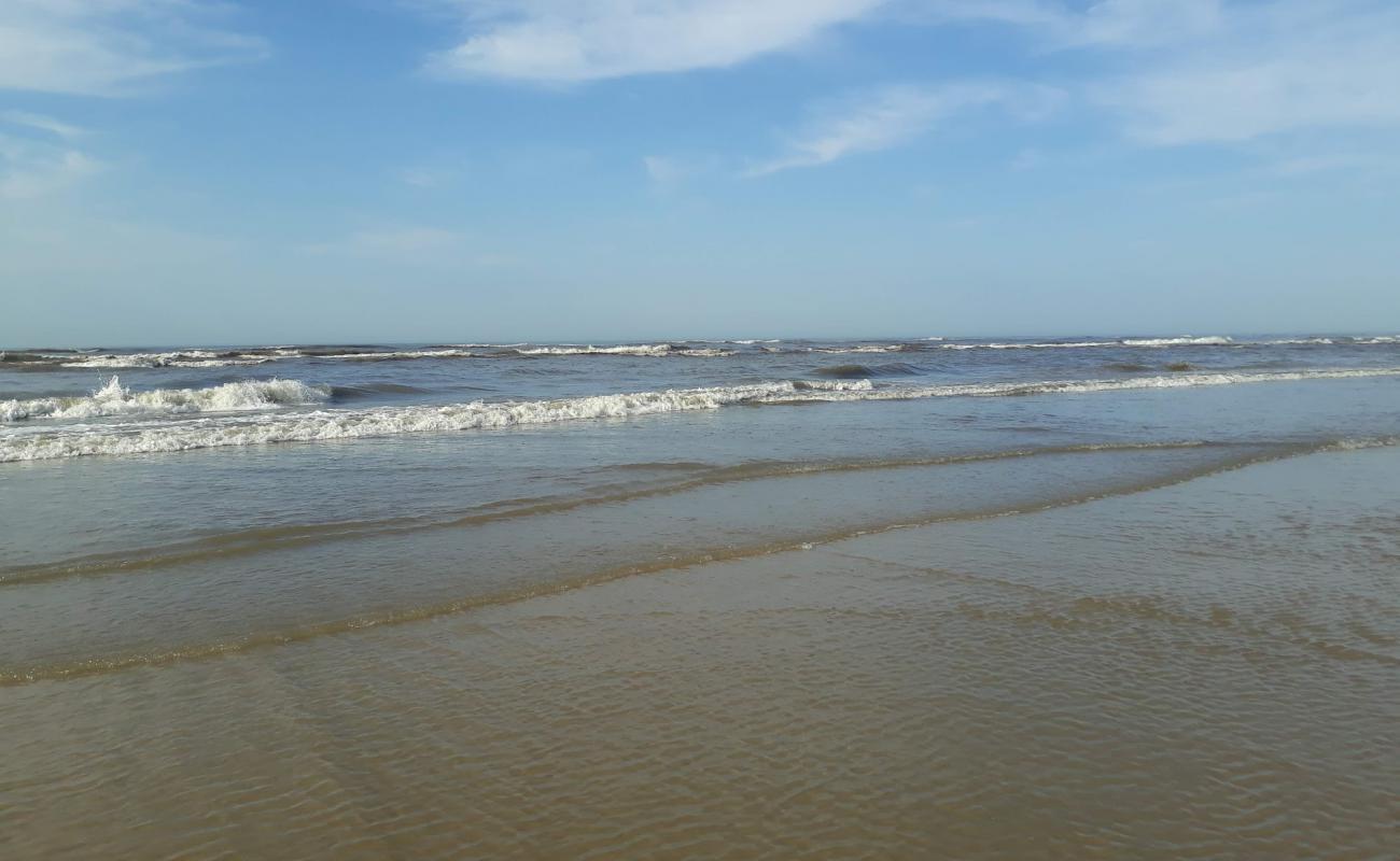 Photo of Golfinho Beach with bright fine sand surface