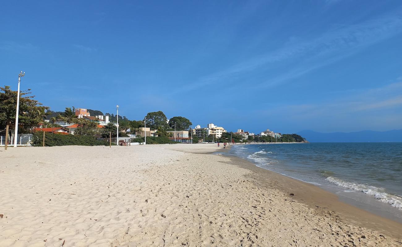 Photo of Canasvieiras Beach with bright fine sand surface