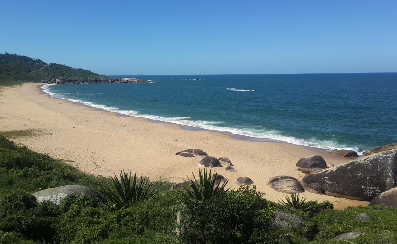 Photo of Taquarinhas Beach backed by cliffs