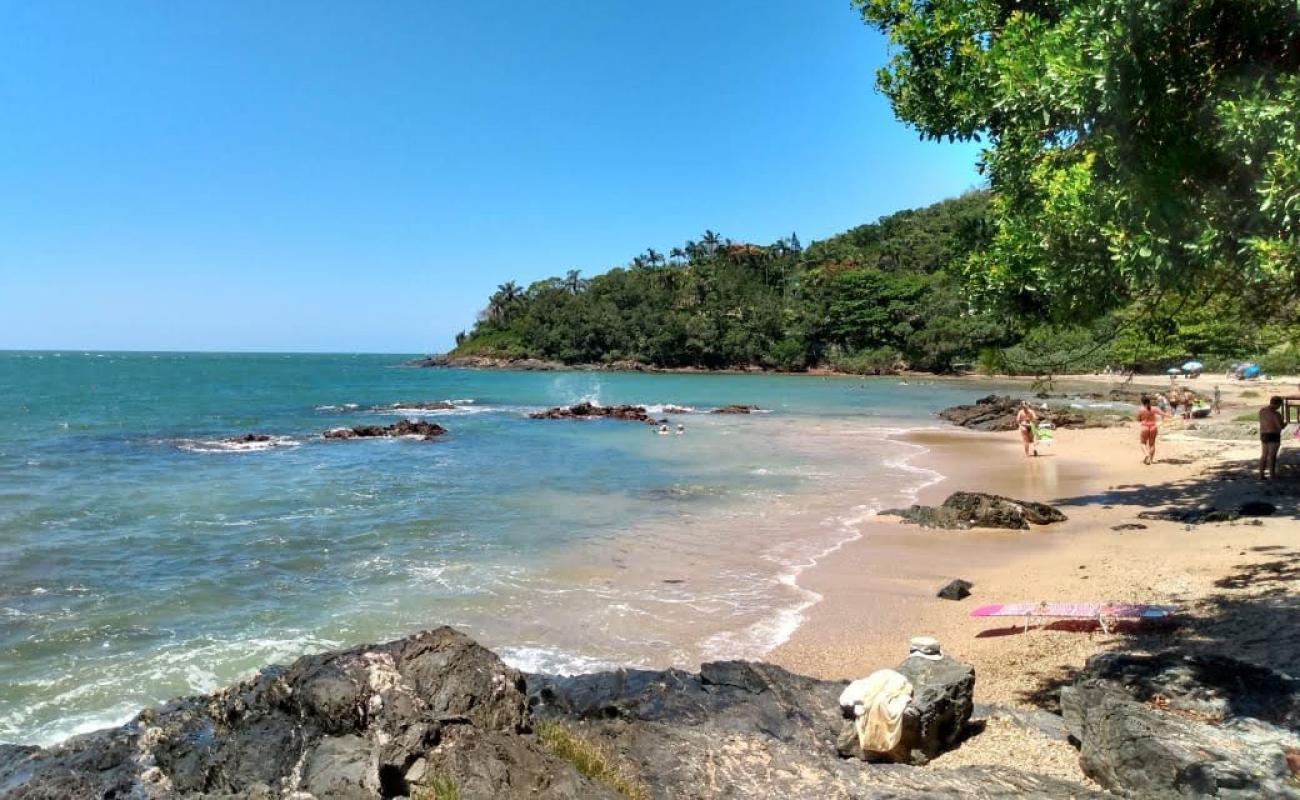 Photo of Canto do Poa Beach with bright sand & rocks surface