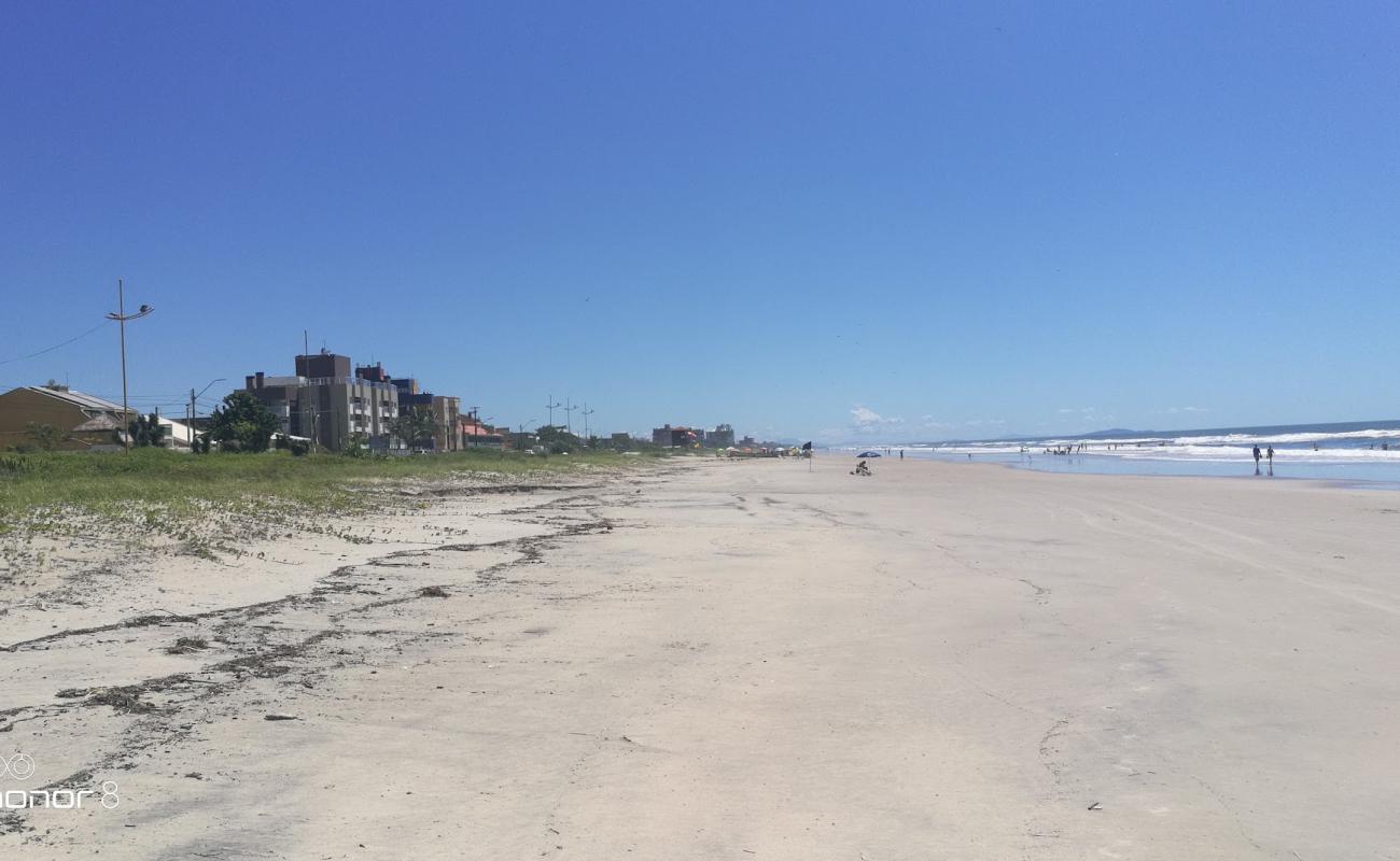 Photo of Balneario Solymar Beach with bright fine sand surface