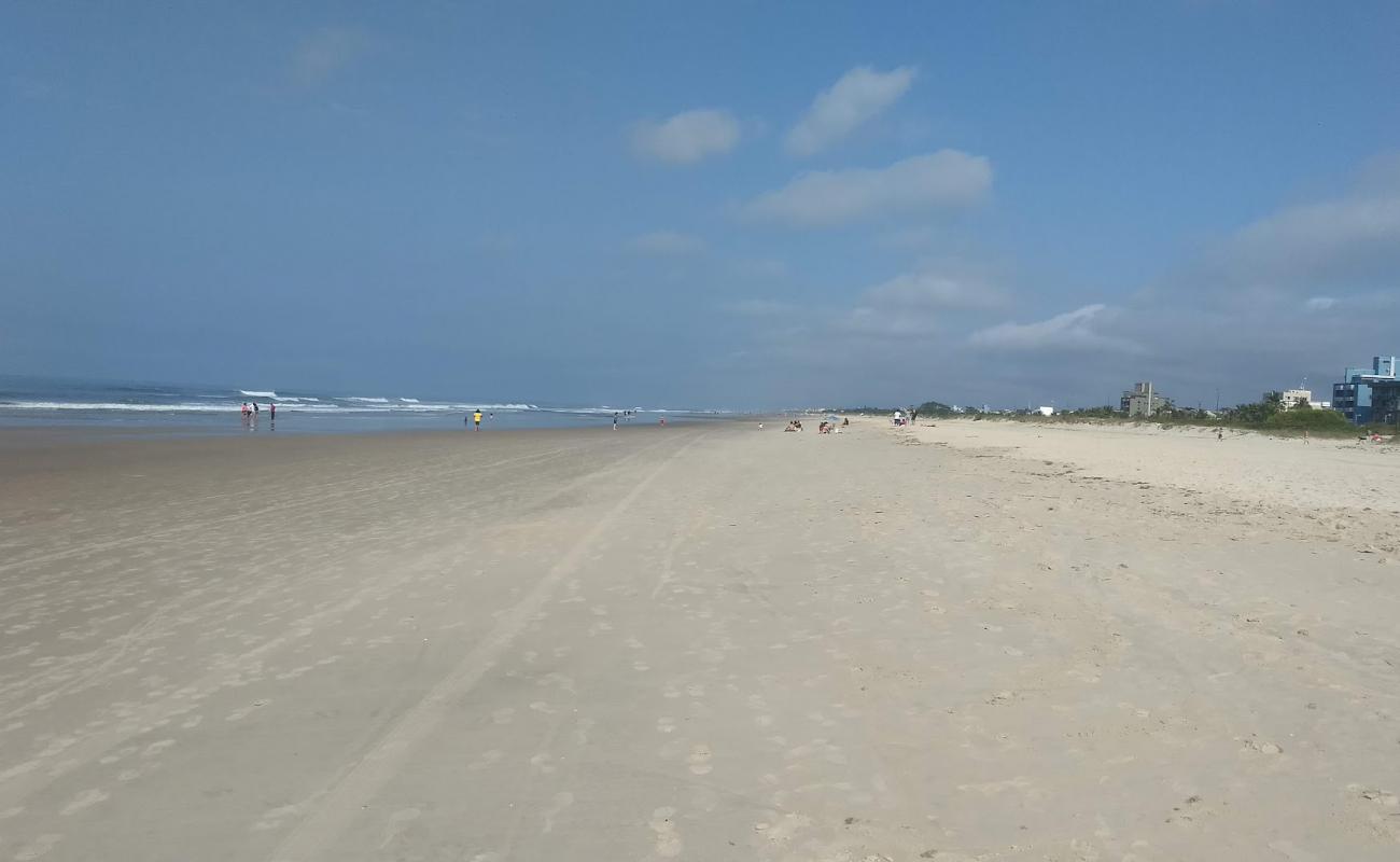 Photo of Balneario Santa Terezinha Beach with bright fine sand surface