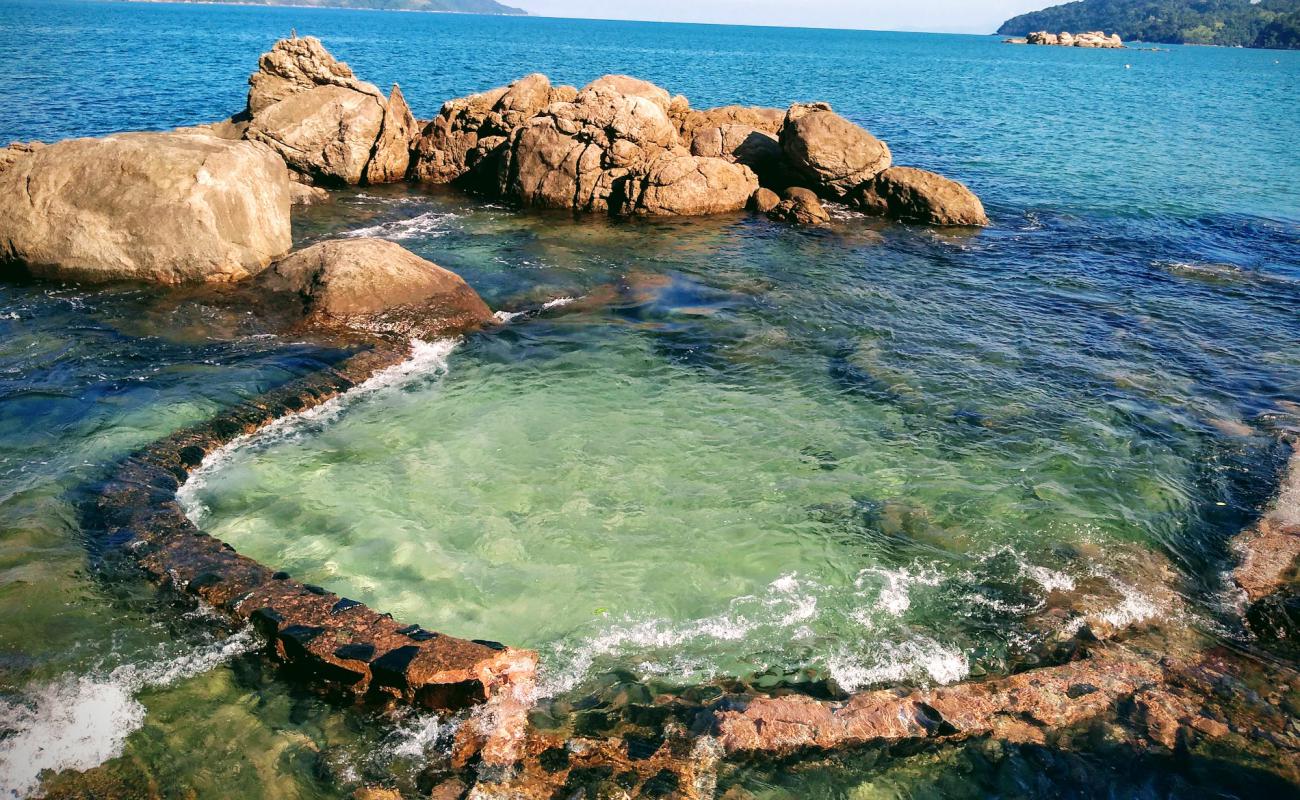 Photo of Natural Pool of Santa Rita with bright sand & rocks surface