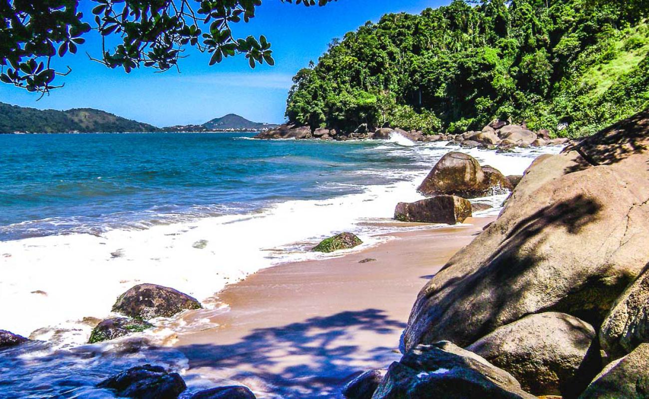 Photo of Saco da Mae Maria Beach with bright sand surface