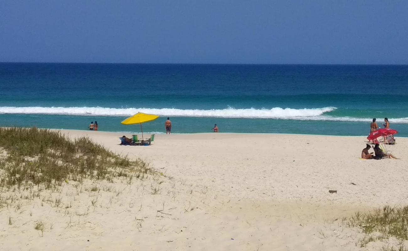 Photo of Dentinho Beach with white fine sand surface