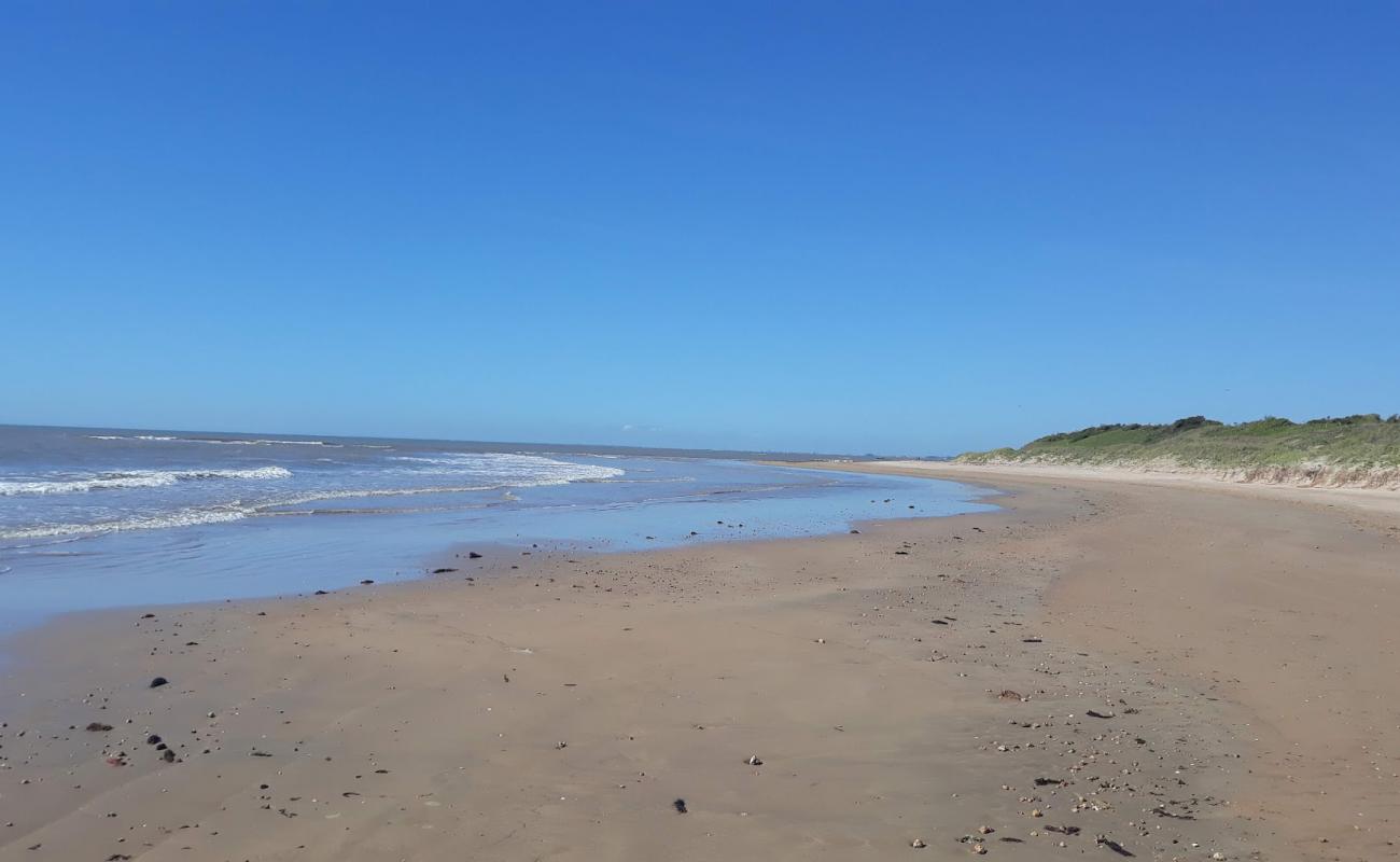 Photo of Manguinhos Beach with bright sand surface