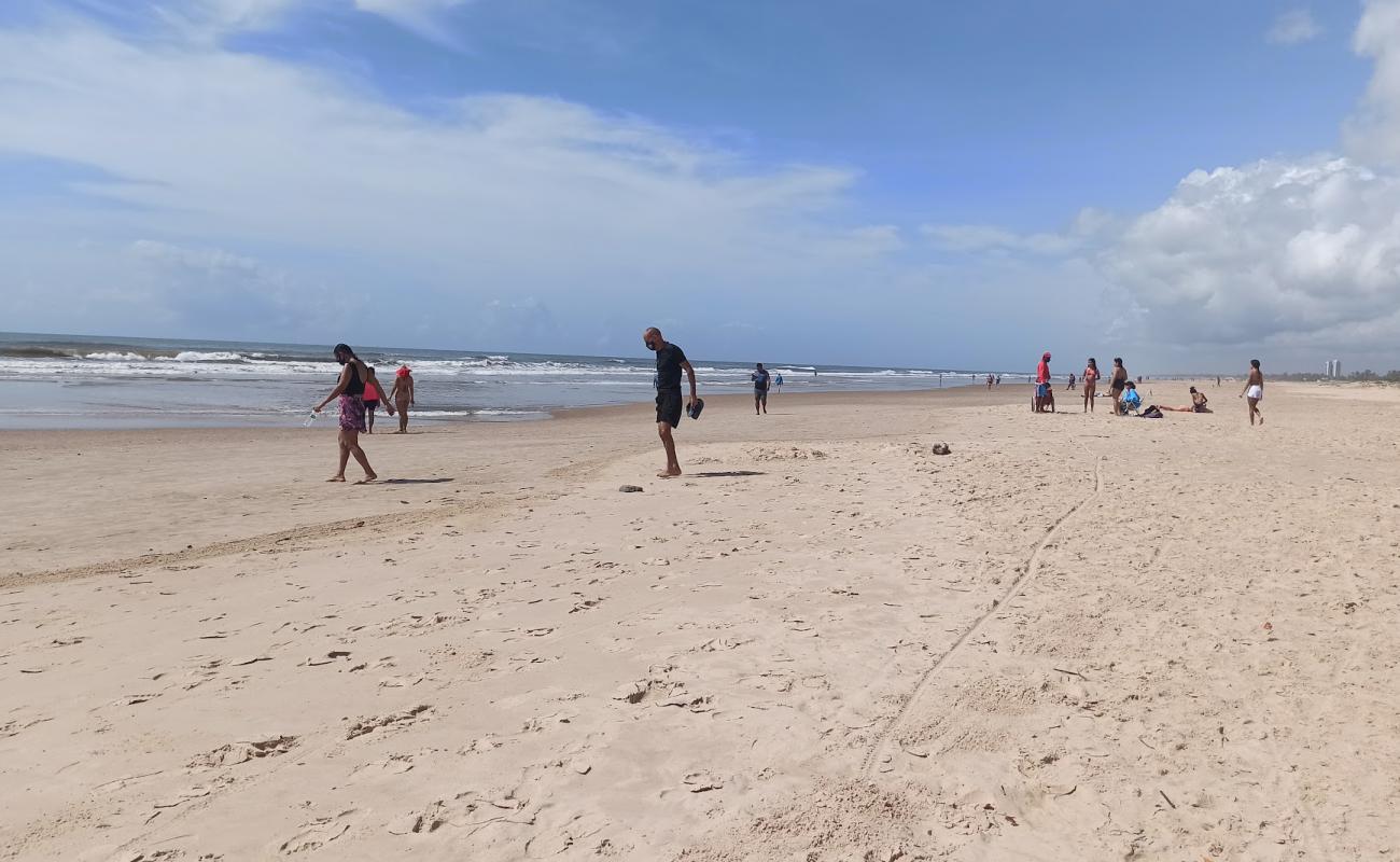 Photo of Aruana Beach with bright fine sand surface