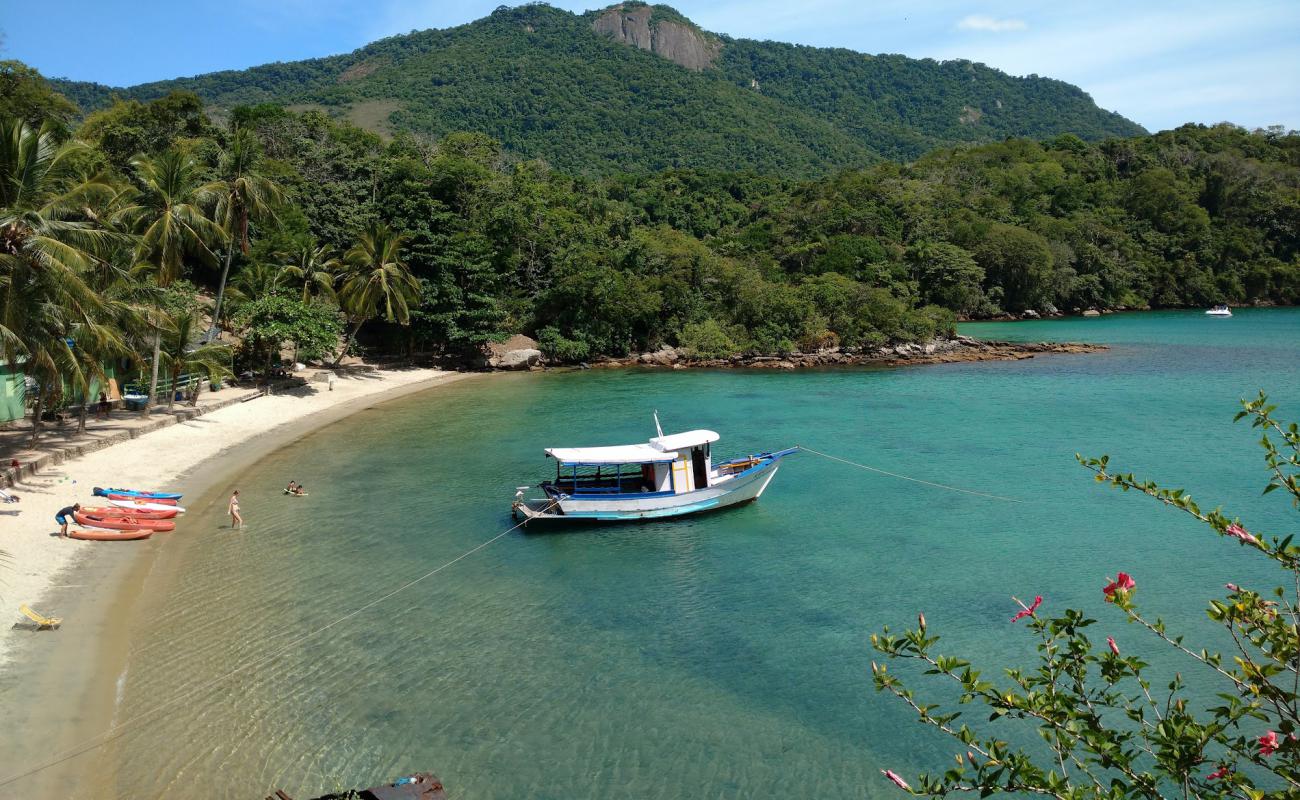 Photo of Praia Dos Macacos with bright fine sand surface