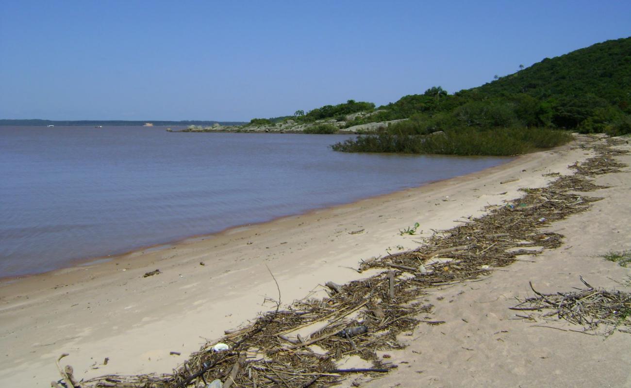 Photo of Praia da Pedreira with bright sand surface