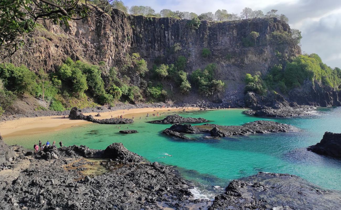 Photo of Baia dos Porcos with bright sand & rocks surface