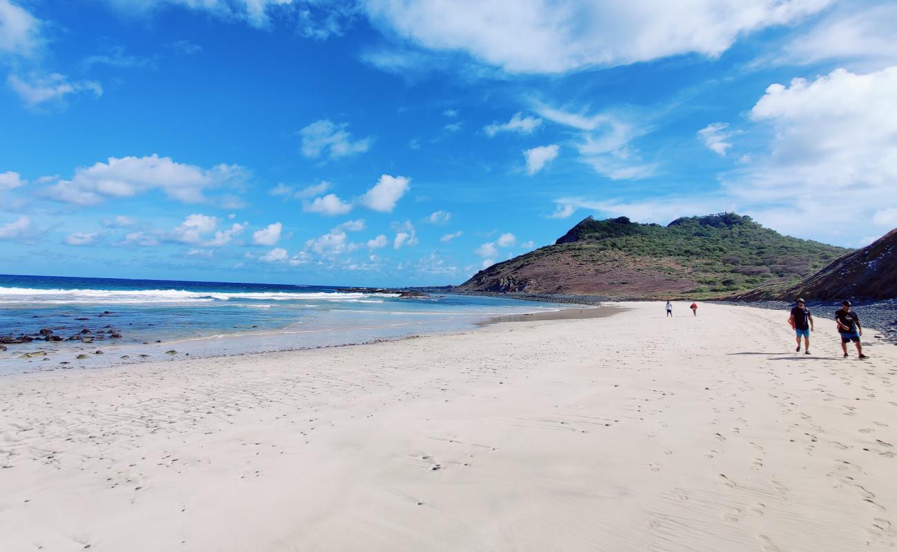 Photo of Enseada da Caieira with bright sand & rocks surface