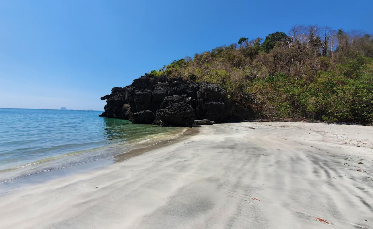 Photo of Gray sand beach with bright sand surface