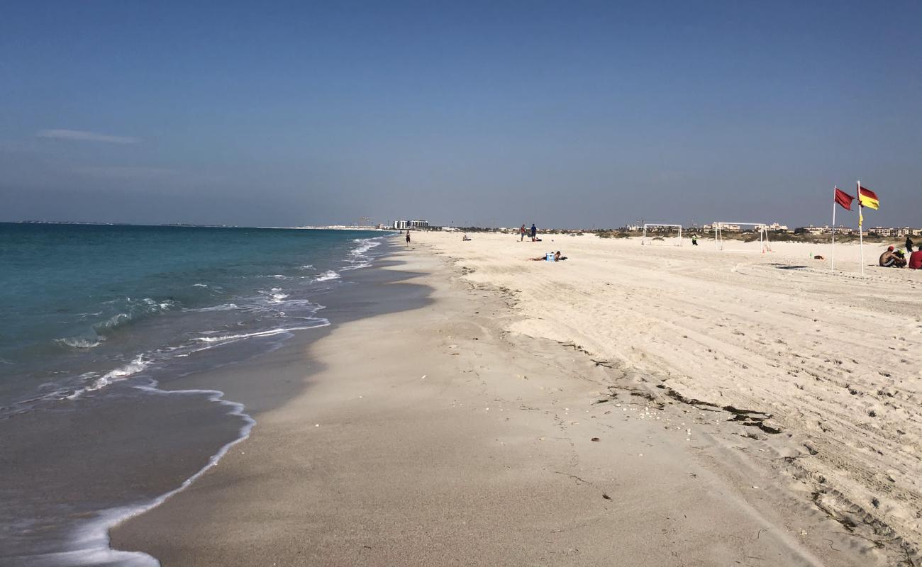 Photo of Saadiyat beach with white fine sand surface